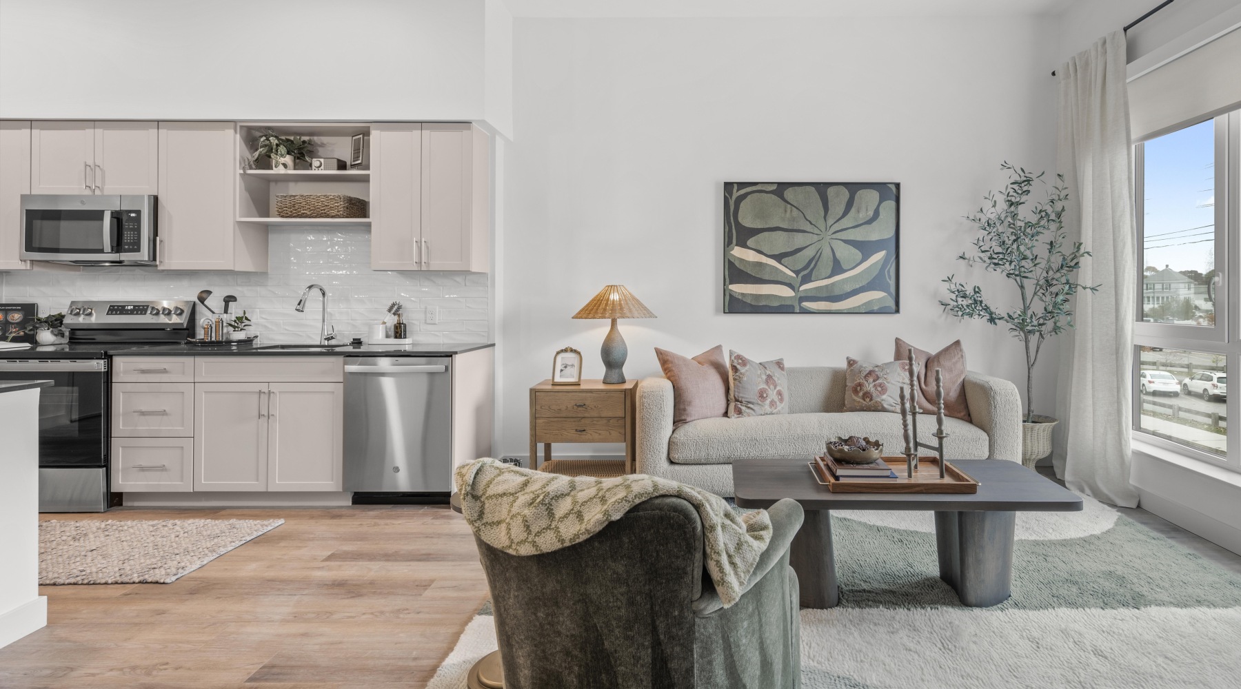 model apartment living room and kitchen with island counter