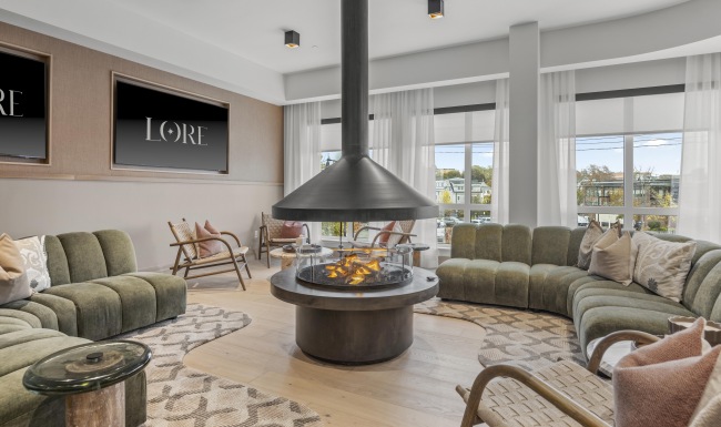 a room with a table chairs and a couch