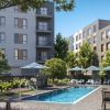 Resort-style swimming pool with lounge seating