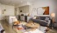 a living room with a couch and a table