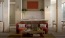 a room with a table chairs and a couch