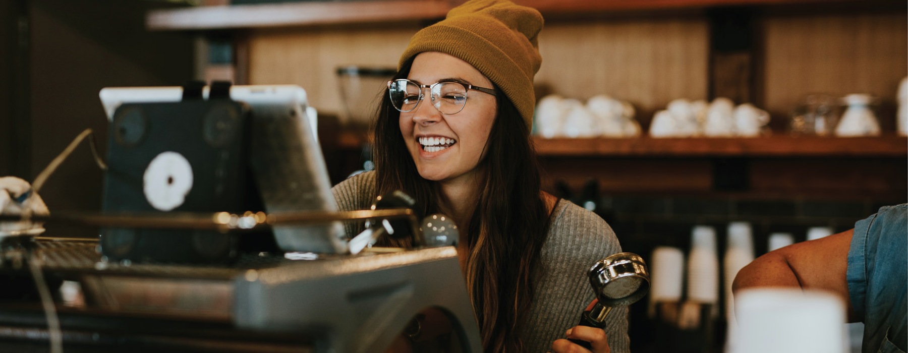 a barista making coffee