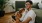 a man holding a dog